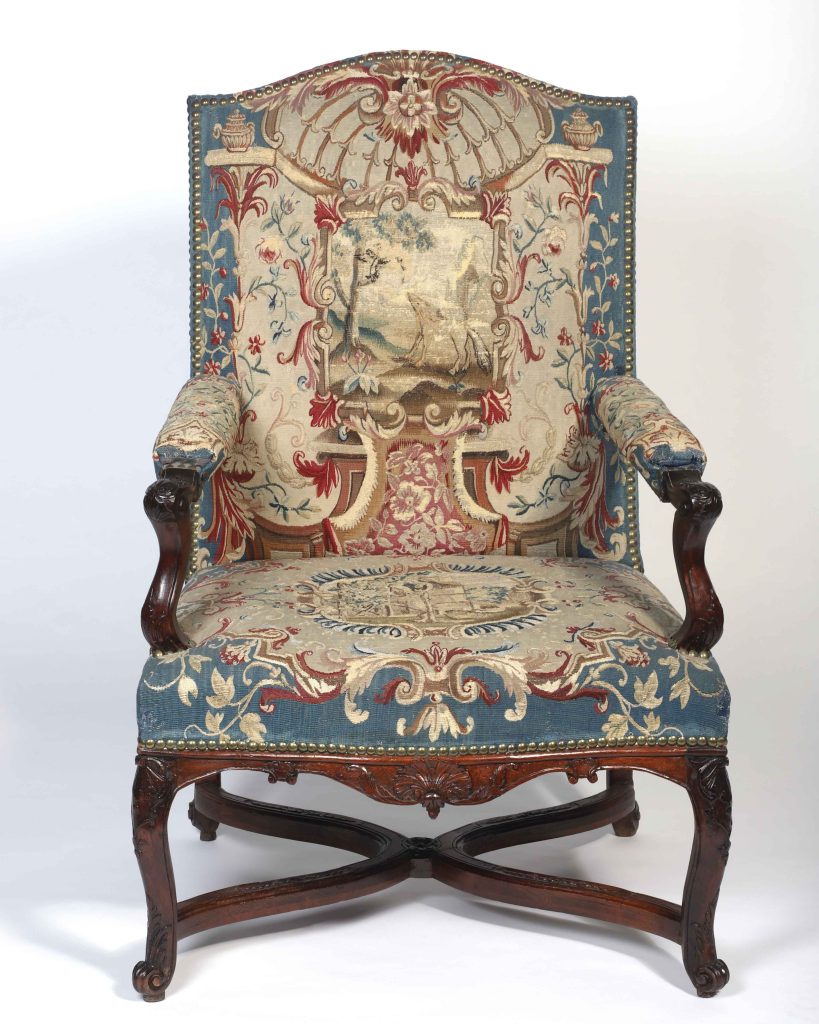 Walnut and upholstered tapestry fabric, circa 1725

U.S. Embassy Prague, Czech Republic

This early-18th century armchair, one of a matching set of six with original tapestry upholstery, depicts didactic tales from the Aesop’s Fables. The chair’s back illustrates the story of “The Eagle and the Fox,” an exhortation to abide by the Golden Rule. The [front?] tells the tale of “The Fox and the Grapes,” counseling honesty rather than self-deception.

Residents and guests in Prague’s Villa Petschek have used these charming chairs at what is now the U.S. Ambassador’s residence in Prague, Czech Republic, for nearly a century. They were purchased in the 1920s by the home’s builder and original owner, wealthy industrialist Otto Petschek. He acquired many antiques from across Europe to furnish his exquisite villa.

This chair and the many other antiques in Villa Petschek have withstood the World War II German, and later Cold War Soviet, occupations, followed by decades of diplomatic events hosted there by U.S. ambassadors to Czechoslovakia, and then the Czech Republic. The antique furnishings, art and objects perform an important diplomatic role, demonstrating that the United States respects and cares for artifacts of cultural and historical value.
